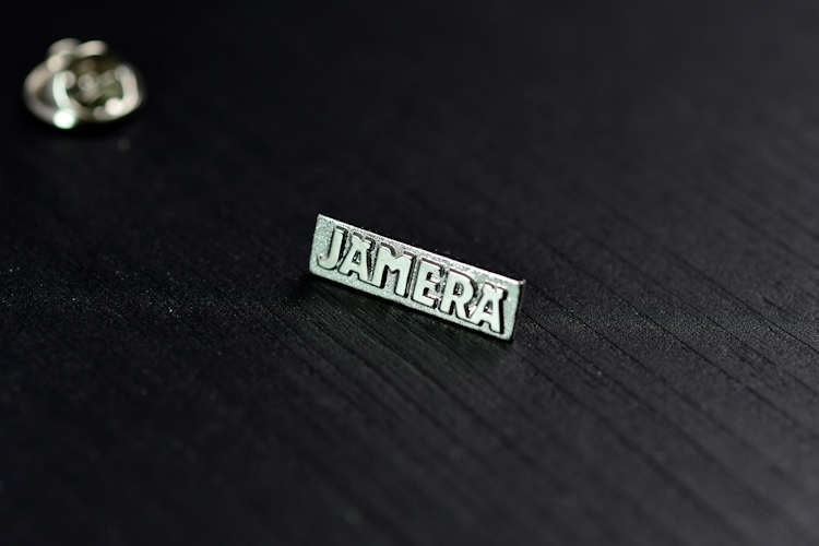 Die struck metal lapel pins