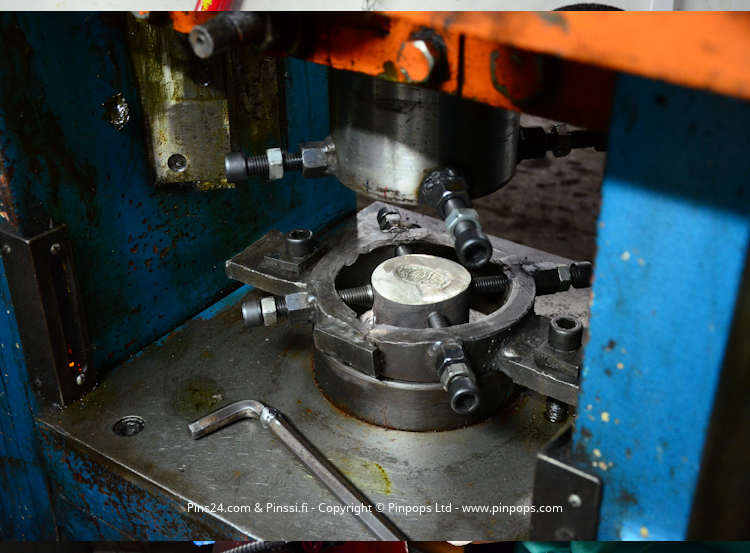 Manufacturing lapel pins in an audited factory