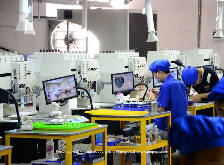Manufacturing lapel pins in an audited factory