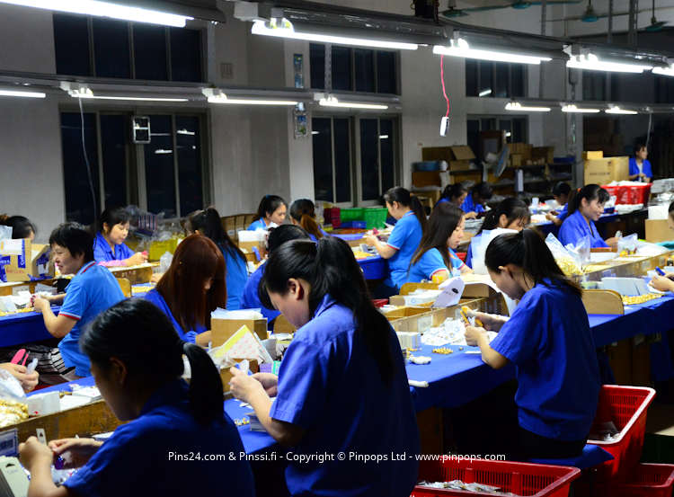 Manufacturing lapel pins in an audited factory